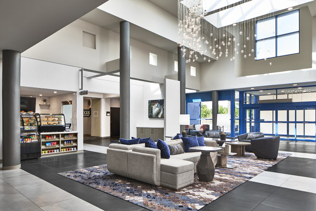 Hotel lobby with couches and a snack area