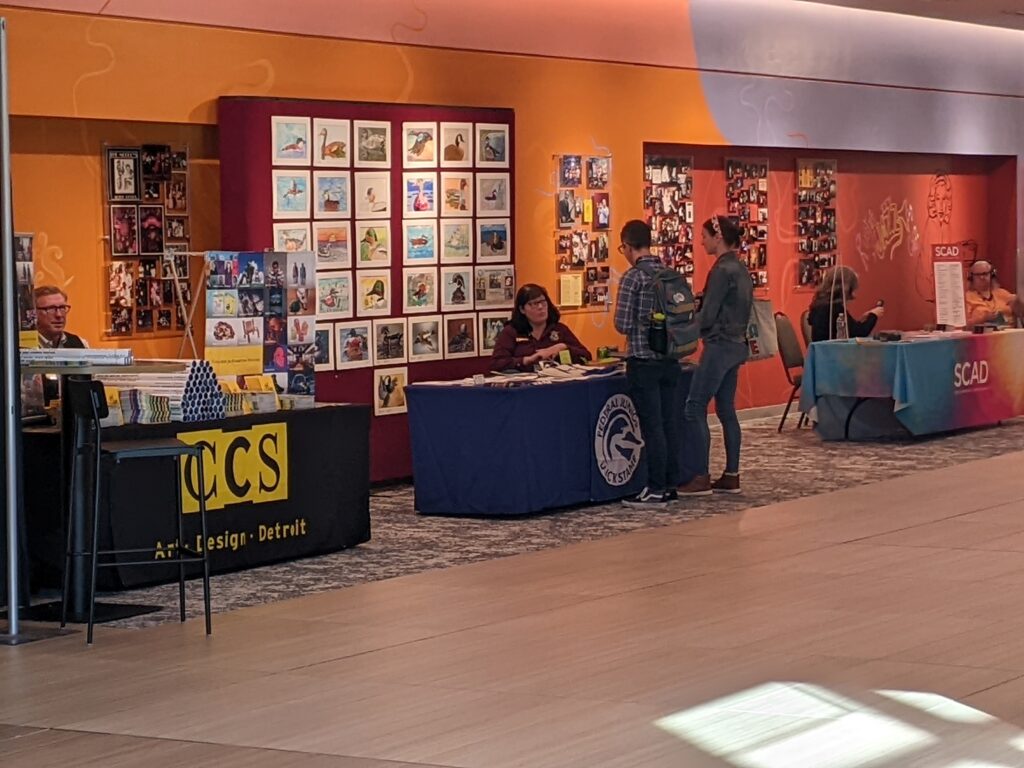 Event with people sitting behind tables